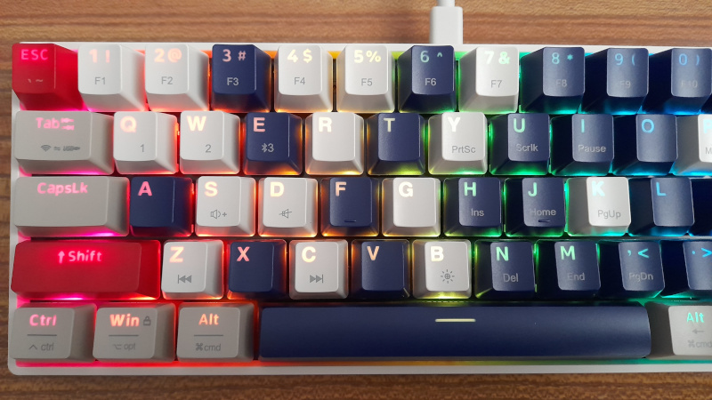 The mixed keycaps of my first mechanical keyboard, with shine-through legends on the keys