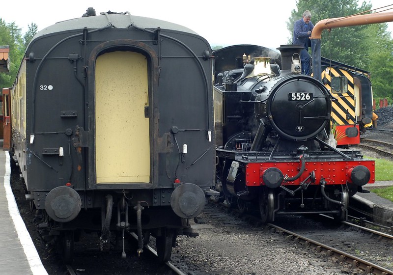 Watering an engine whilst rounding the train